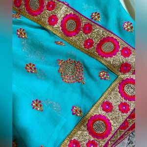 Mint green Saree only worn once. With XS ready to wear blouse.